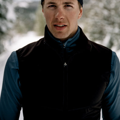 Close-up of a man wearing the Ace skivest and Ace jacket underneath.