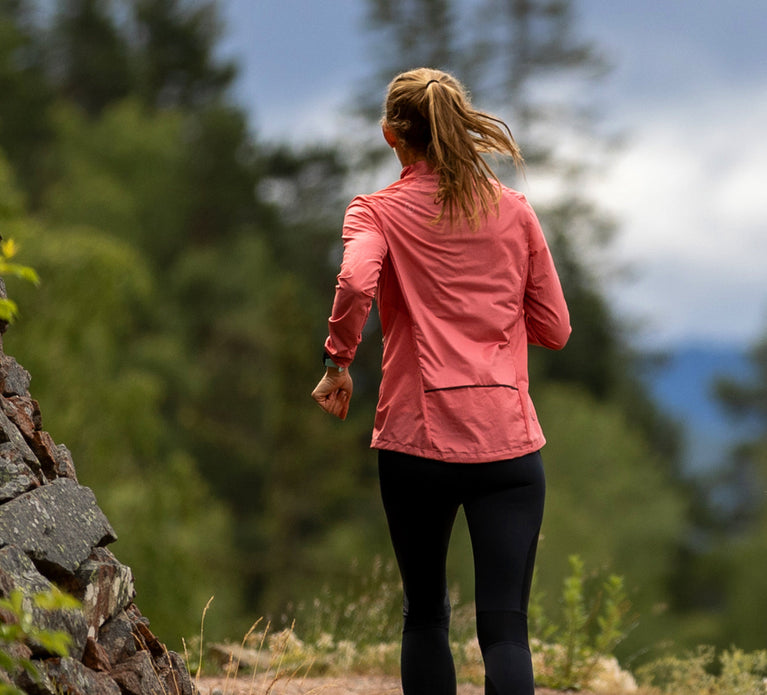 Woman jogging in Trimtex Fast running jacket