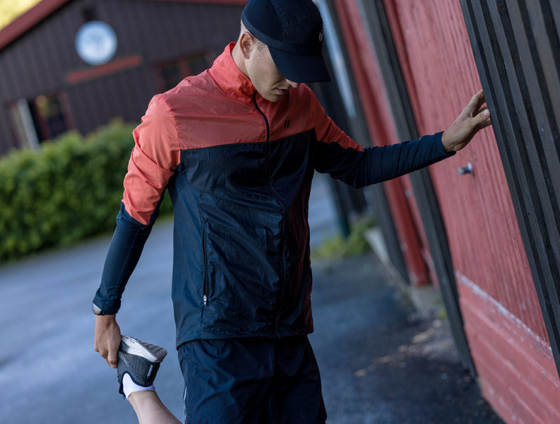 Runner streching after going out for a run.