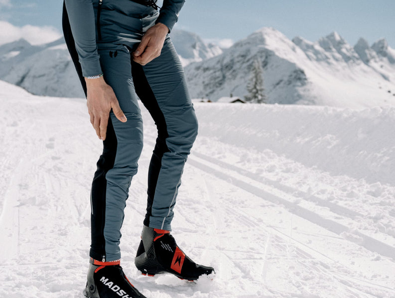 Man adjusting Trimtex Pulse Ski Pants.