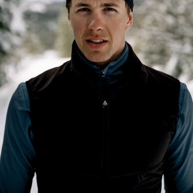 Close-up of a man wearing the Ace skivest and Ace jacket underneath. 