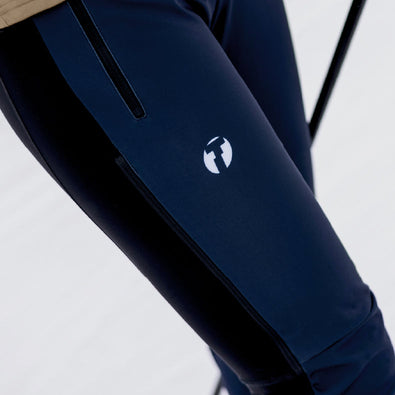 Close-up of Ace pants for women showing the zipper reaching upper thigh.